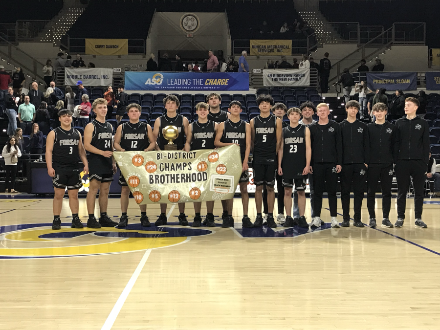 The Forsan boys basketball team celebrates its bi-district playoff win over Ballinger at Angelo State's Junell Center on Monday, Feb. 23, 2026.