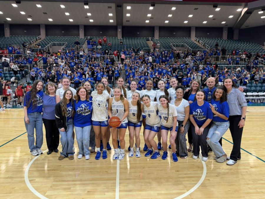 The Central Heights girls basketball team celebrates after its state semifinal win Tuesday, March 3, 2026.