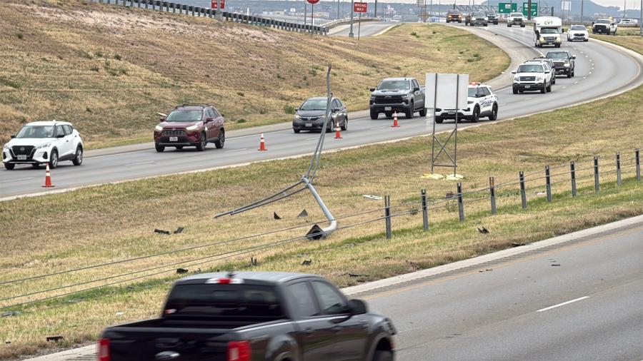 A crash on the Houston Harte Expressway on Wednesday morning knocked down a light pole and is slowing traffic in both directions.
