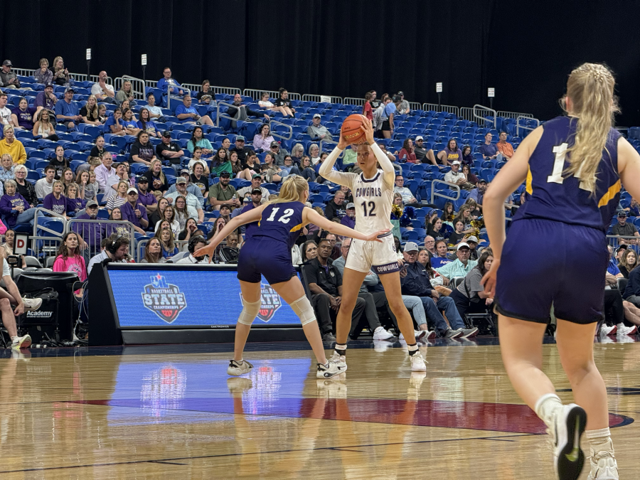 Mason's Flora Appleton looks for room against the defense of Panhandle's Addison McCoid in the state final Thursday, March 5, 2026.