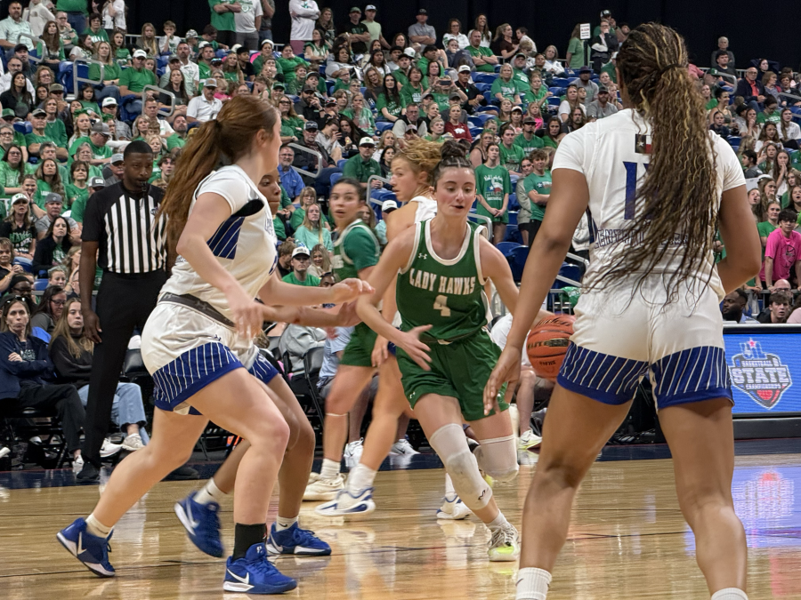 Wall's McKenzie Lopez drives against Central Heights' defense in the Class 3A Division II state final Friday, March 6, 2026.