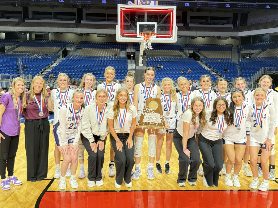 The Mason Cowgirls pose with their runner-up trophy after losing to Panhandle in the state final Thursday, March 5, at the Alamodome in San Antonio.