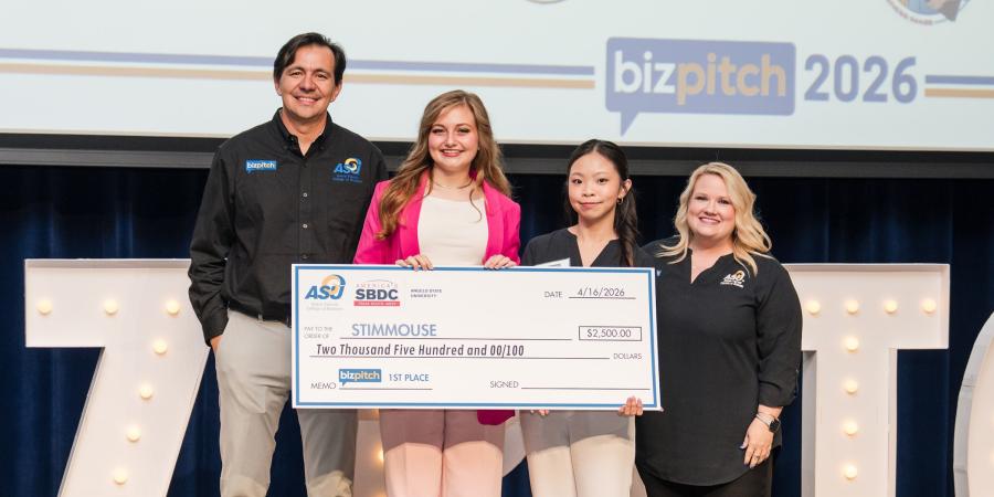 2026 BizPitch winner Audrey Spearman (in pink) with ASU and SBDC representatives