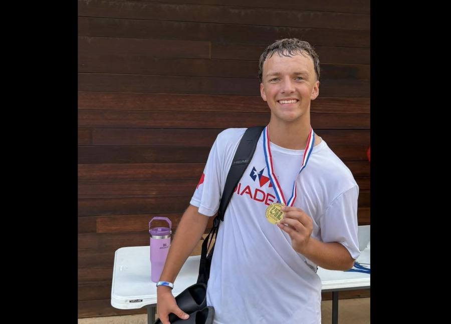 Olfen's Grant Halsell smiles after winning the regional tennis title in boys singles. He went on to take third place at the 1A state tournament.