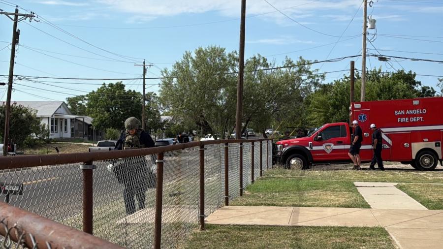 SWAT surrounds a house where barricaded subject is located on June 25, 2026