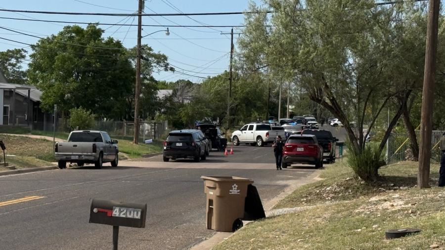SWAT surrounds a house where barricaded subject is located on June 25, 2026
