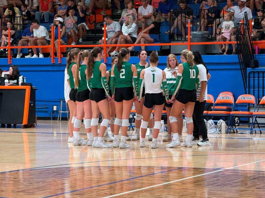 Wall talks during a timeout in the Nita Vannoy Volleyball Tournament final on Saturday, Aug. 22, 2026.