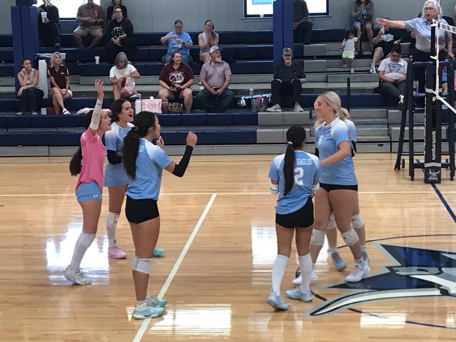 The TLCA San Angelo volleyball team celebrates a point during the 2026 Nita Vannoy Memorial Tournament.