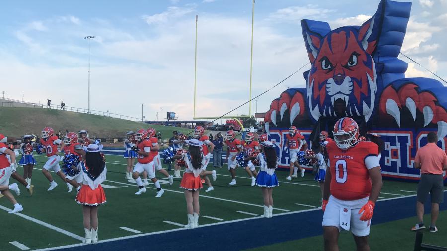 Riley Oines (0) and the Central Bobcats make their way onto the field at San Angelo Stadium before the season opener against Abilene High on Friday, Aug. 28, 2026.