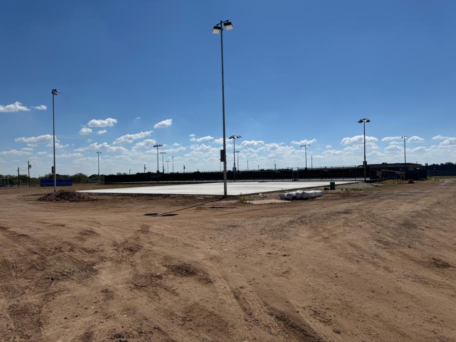 New tennis courts are under construction as well as lighting for the courts.