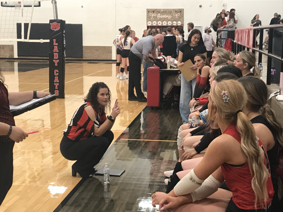 Ballinger head volleyball coach Robynn Jones talks to her team Tuesday, Oct. 20, against Coleman.