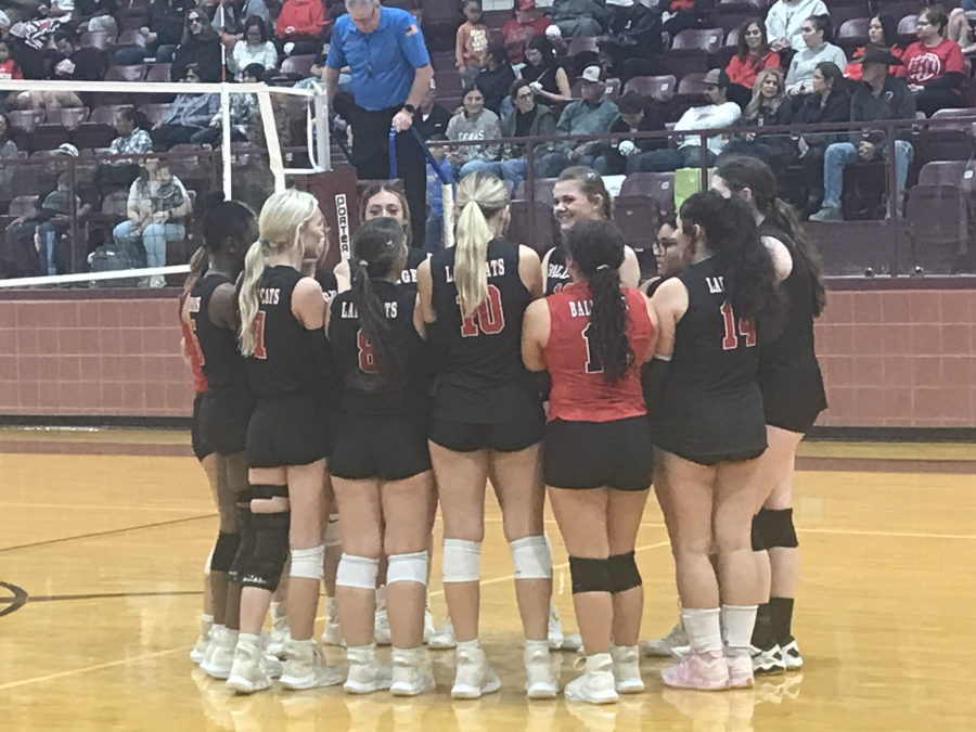 The Ballinger volleyball team huddles before its playoff match against Colorado City on Thursday, Oct. 29, 2026.