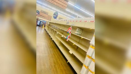 Empty shelves in the bottled water section at Market Street