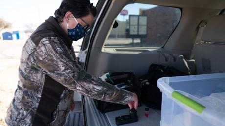 Courtney Lemons from the City of San Angelo Water Quality division collects water samples following winter storm that froze pipes and dropped water pressure on Feb. 22, 2021