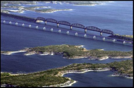 The U.S. 90 bridge and Union Pacific railroad bridges traversing Lake Amistad near Del Rio, Texas. 