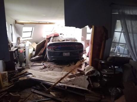 A black 2016 Dodge Charger crashed through a San Angelo home on July 11, 2021. 