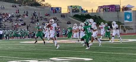 #12 QB1 Tyler Hill scores on a quarterback keeper against El Paso Montwood on Sept. 3, 2021.