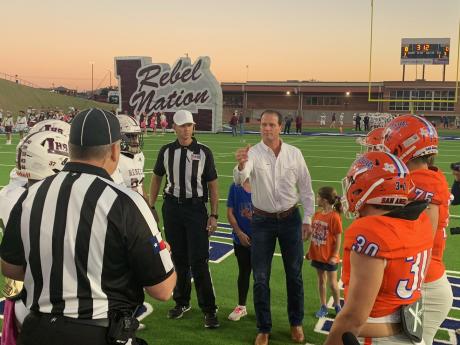 Congressman August Pfluger conducts the coin toss at the San Angelo Central vs. Midland Legacy Rebels on Oct. 29, 2021