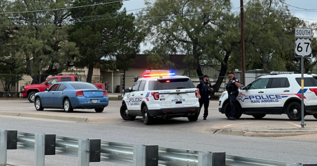 Blue Charger Stopped by Police Outside at the Intersection of the Loop and Glenna