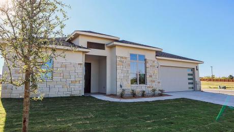 This lovely home is located in a private one way in and one way out cul-de-sac that is gated.