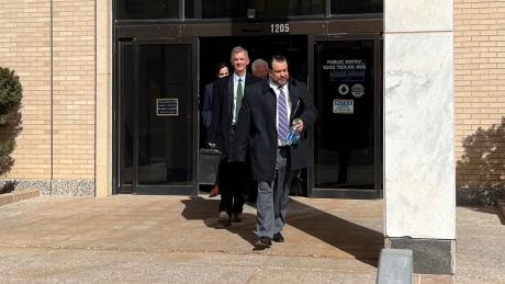 Tim Vasquez leads his attorney David Guinn out of the federal courthouse in Lubbock