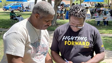 Pastor Gary Jenkins collects signatures to be placed on the November 8, 2022 ballot for Tom Green County Judge at the annual Juneteenth Celebration at MLK Park on June 18, 2022