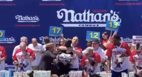Joey Chestnut Wins, Slams Protester to Ground