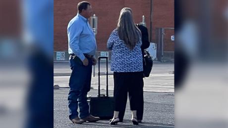 A courtroom loser, Dusty Thompson and his wife are consoled by their attorney after losing a lawsuit for deceptive trade practices.