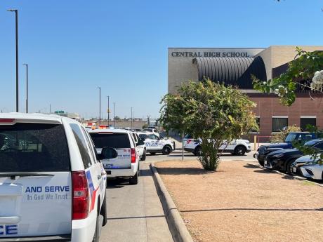 Police surround Central High School on September 30, 2022