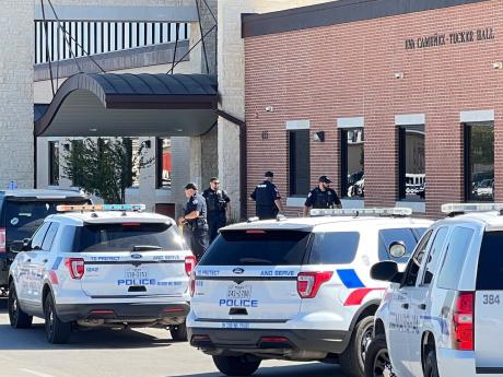 Police surround Central High School on September 30, 2022