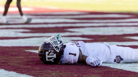 Texas A&M wide receiver Evan Stewart (1) lays in the end zone after dropping a pass during an NCAA football game against Mississippi State, Saturday, Oct. 1, 2022, in Starkville, Miss. (AP Photo/Vasha Hunt)