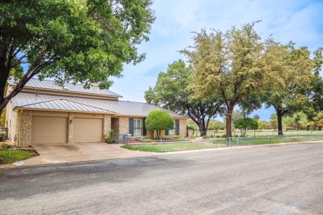 SAN ANGELO, TX — Enjoy gorgeous views of the golf course in an easy-to-care-for custom home. 