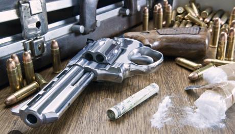 Handgun Ammo & Drugs (Courtesy/googleimages)