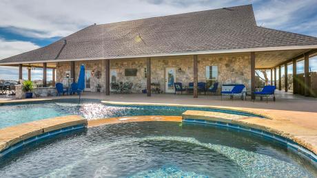 An exotic ranch with a fabulous pool.