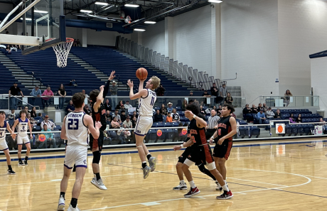 Trevin Coffell scores for the Hornets