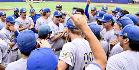 Head Coach Kevin Brooks (Middle) Celebrates with his Team