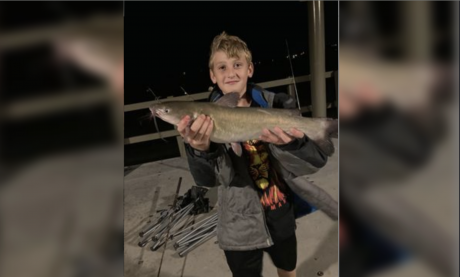 Ryan Calder, 11, and his catch from the new pier at Lake Nasworthy