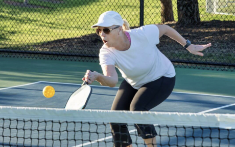 Woman Playing Pickleball, an up and coming sport in the United States