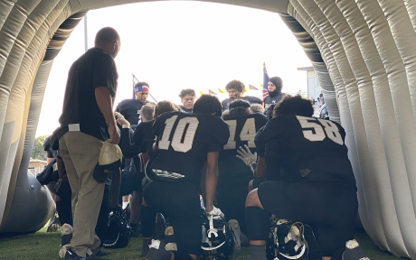 The Brady Bulldogs Say the Lord's Prayer Before Taking the Field Against the Dublin Lions.