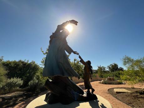 Lady in Blue Bronze Statue on the Concho River San Angelo During Eclipse 14oct23 (LIVE! photo Yantis Green)