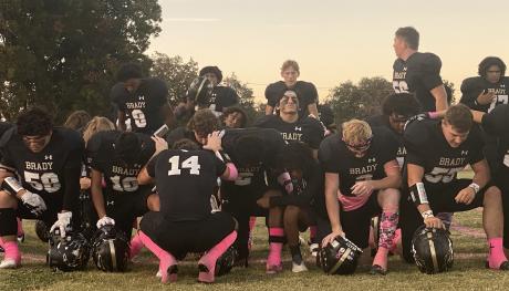 The Brady Bulldogs Pray Before Taking the Field Against the Ballinger Bearcats