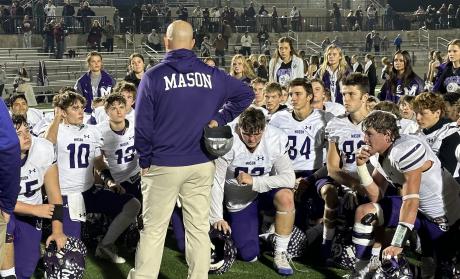 Mason's Head Coach McLeod speaks to the Punchers after the Area Round loss to Ganado