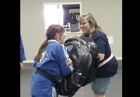 Two Women Sparring at Team Chip