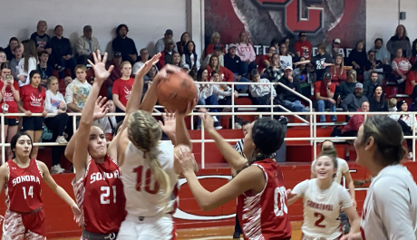 Christoval's Halle Hughes goes up for a shot against Sonora