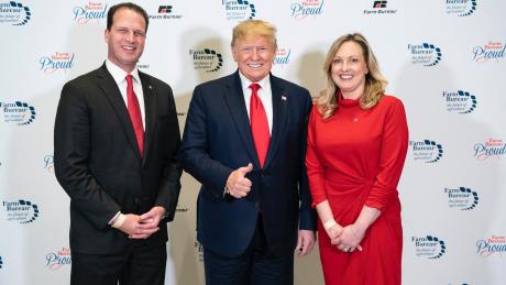 Rep. August Pfluger (left) with Donald Trump and Pfluger's wife, Camille (right).