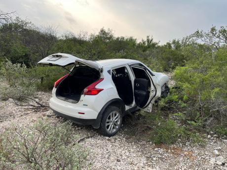 The getaway car that crashed when in pursuit of Texas DPS. The care was carrying a driver and five smuggled illegal aliens. 