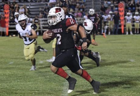 Ballinger running back Zach Canada breaks away against Clyde's defense in a 2022 game.