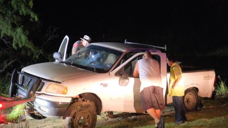 The vehicle was identified as an older white Ford F-150.