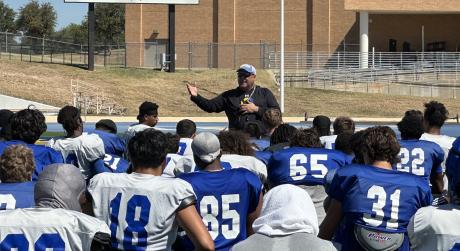 Angelo State Head Coach Jeff Girsch breaks out the Rams after practice.