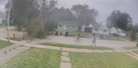 Cyclist Narrowly Escapes Injury as Tree Falls Amid Thunderstorm
